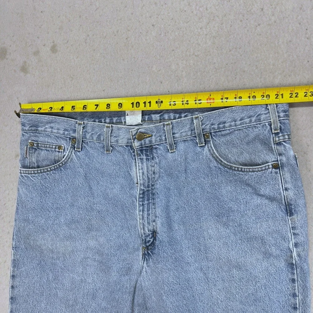 Vintage Carhartt Mens Relaxed Fit Tapered Leg Jeans Light Wash Blue 44x32
